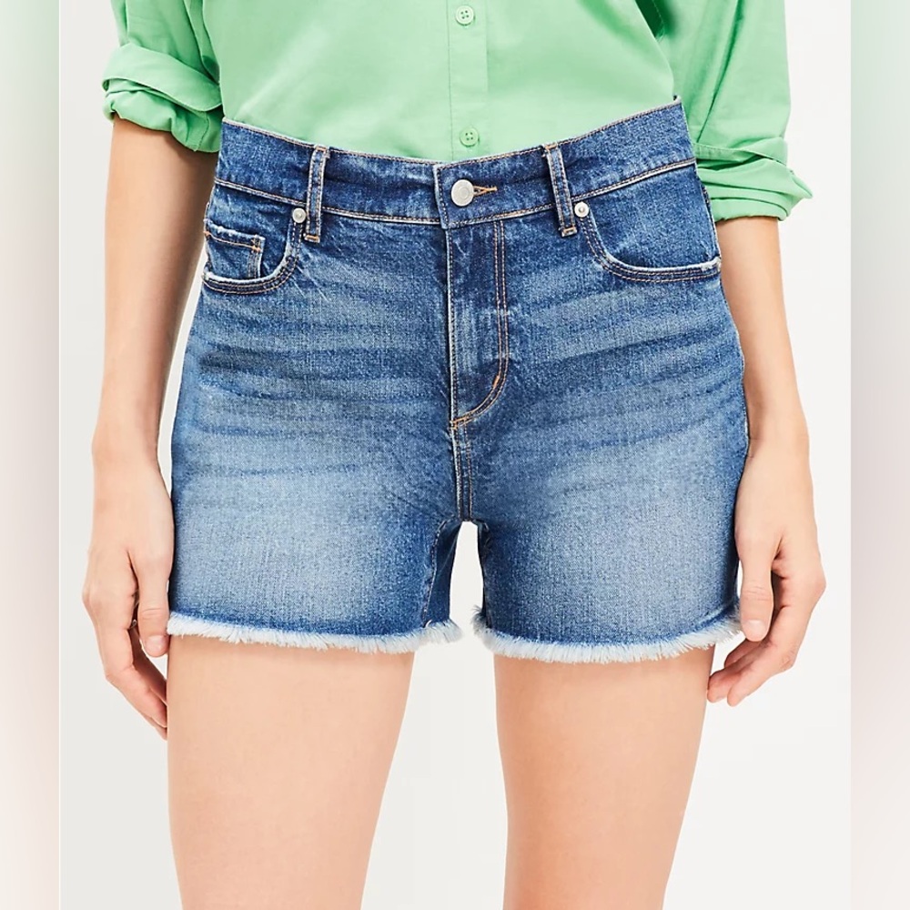 Frayed high rise cut off denim shorts